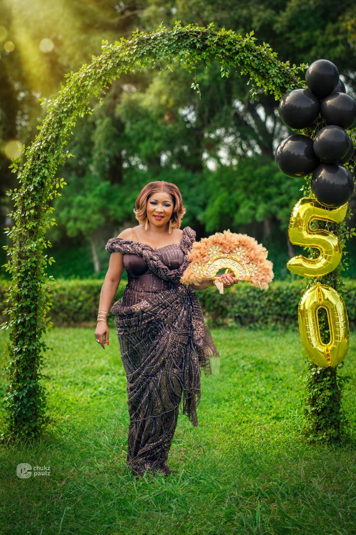 Bronze sequinned corset gown worn at a 50th birthday celebration