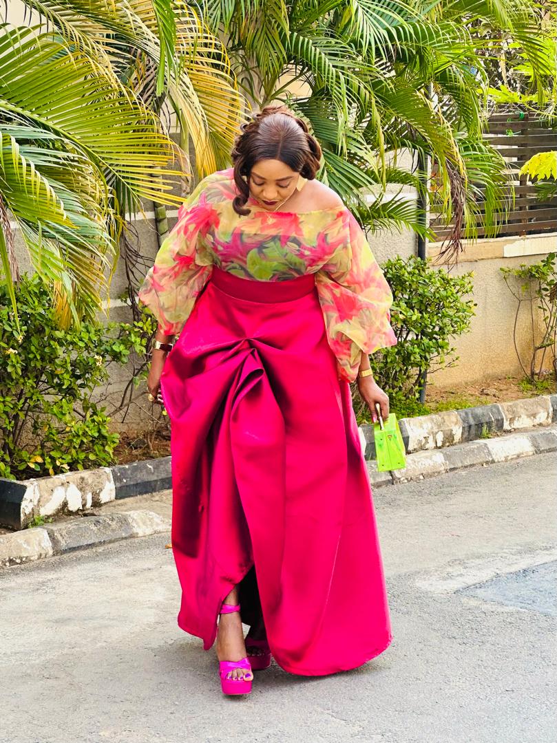Fuchsia satin wrap skirt with a floral organza balloon-sleeve bodice